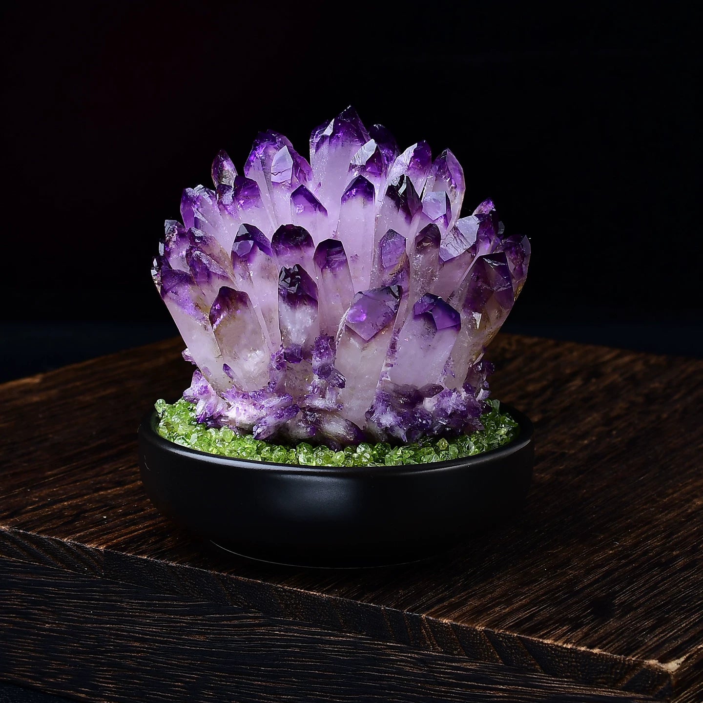 Amethyst cluster with natural matrix and sparkling violet crystal points close view