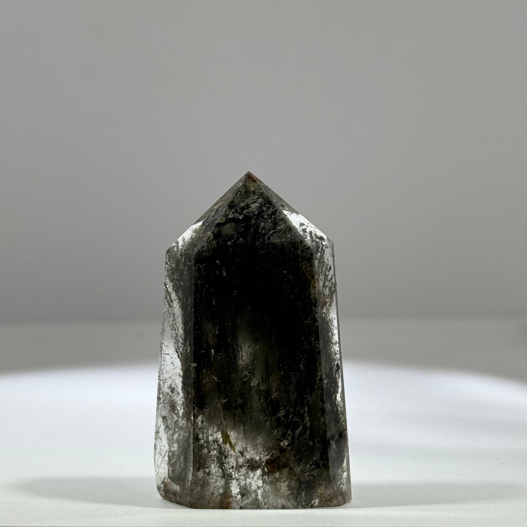 Green phantom quartz single point tower with grey green inclusions for meditation and home decor