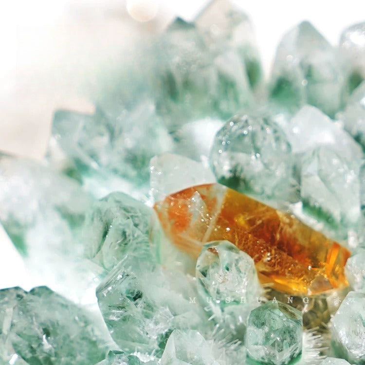 Natural phantom quartz mineral specimen with green inclusions for crystal collections